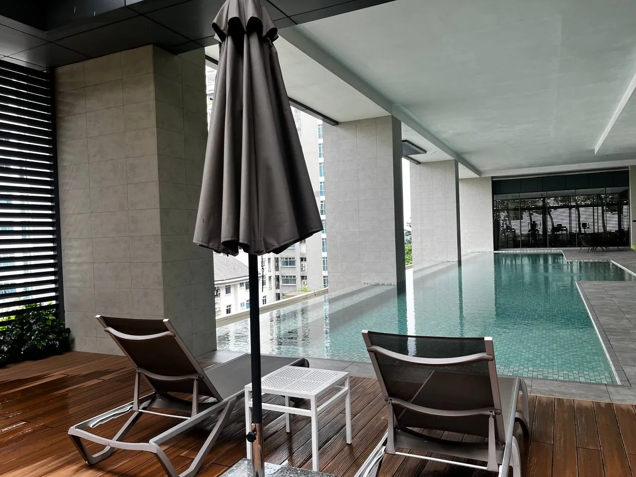 Swimming pool and seating area at Pinnacle Bangsar